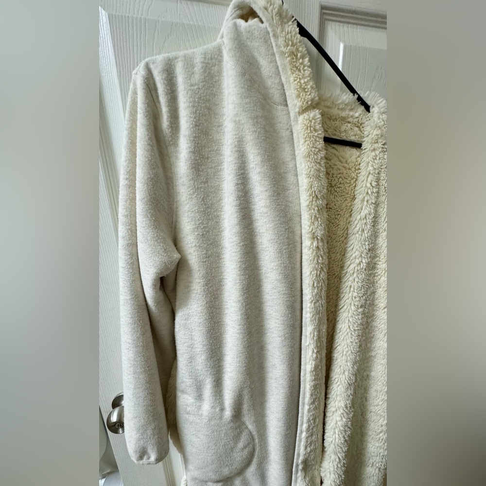 UGG Cozy Cream Fuzzy Fleece Robe with pockets and hood.
